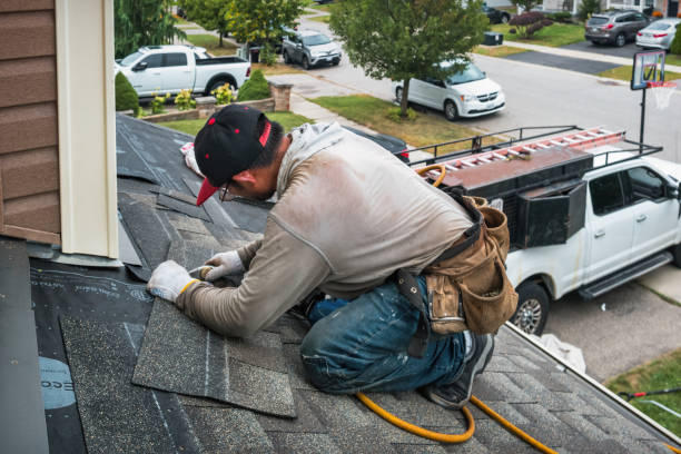 Professional Roofing technician working in Norfolk, MA
